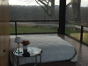 glass-house-interior-view-from-bed